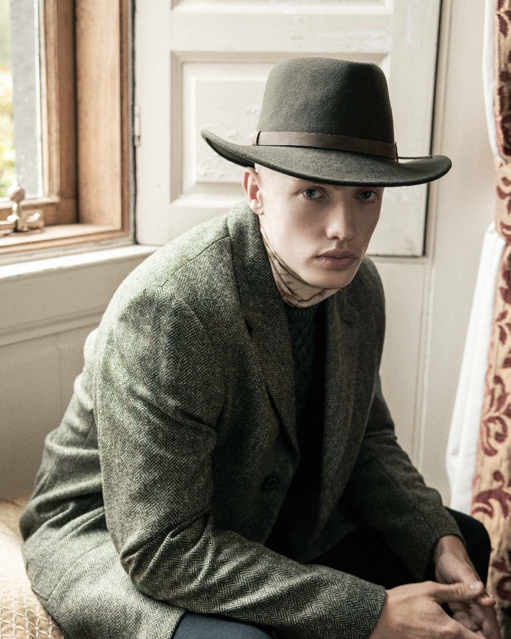 Olive Coloured Jack Murphy Boston Crushable Felt Hat on outdoor background 