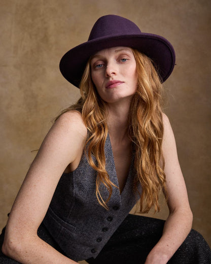 Plum Coloured Jack Murphy Boston Crushable Felt Hat on indoor background 