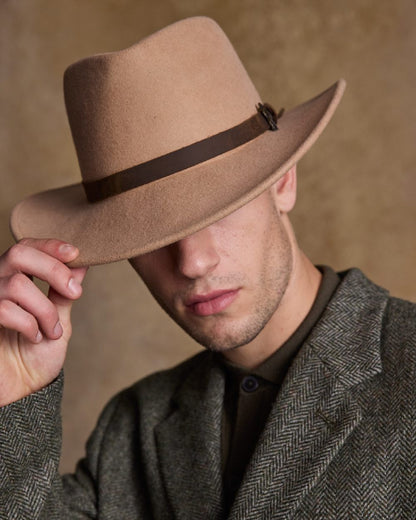 Tan Coloured Jack Murphy Boston Crushable Felt Hat on indoor background 