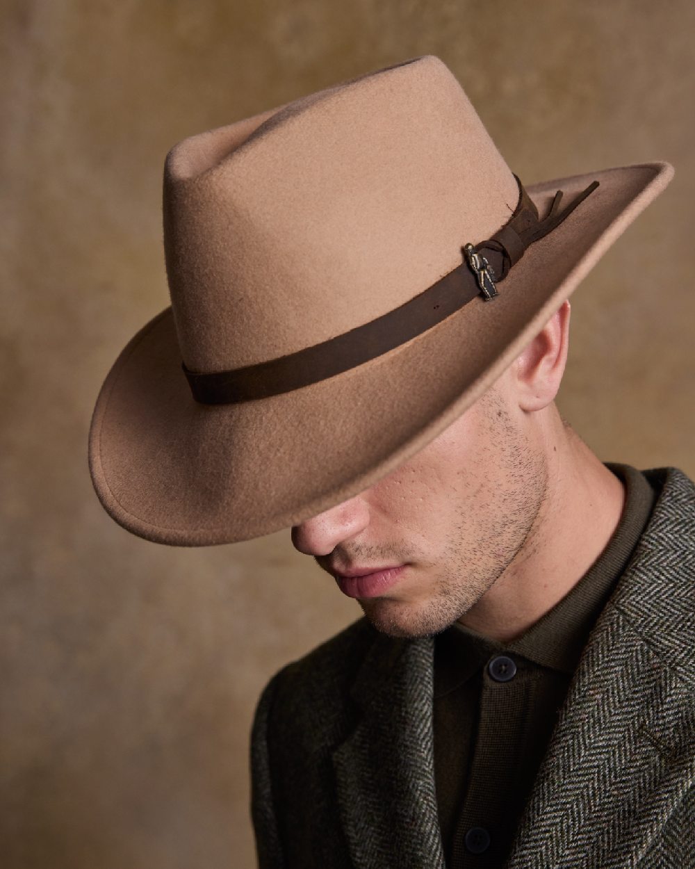 Tan Coloured Jack Murphy Boston Crushable Felt Hat on indoor background 