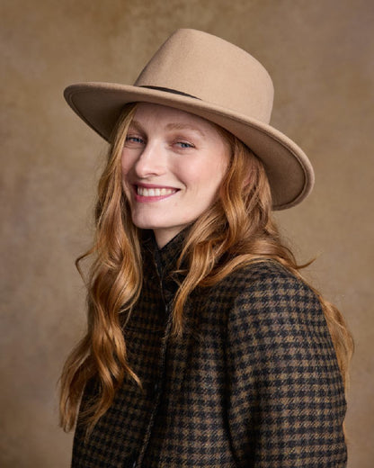 Tan Coloured Jack Murphy Boston Crushable Felt Hat on indoor background 