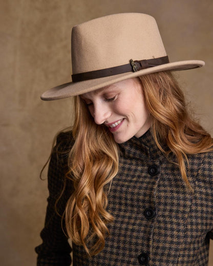 Tan Coloured Jack Murphy Boston Crushable Felt Hat on indoor background 