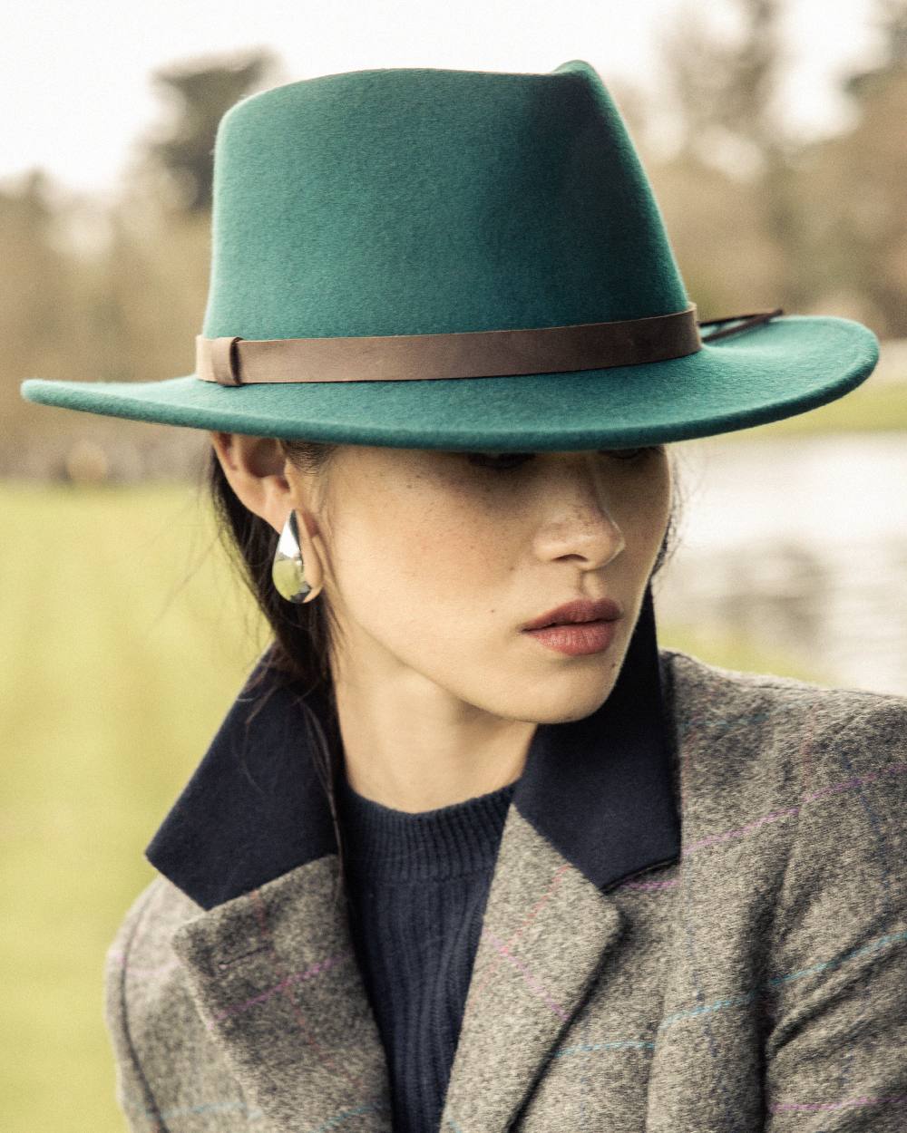 Teal Green Coloured Jack Murphy Boston Crushable Felt Hat on outdoor background 