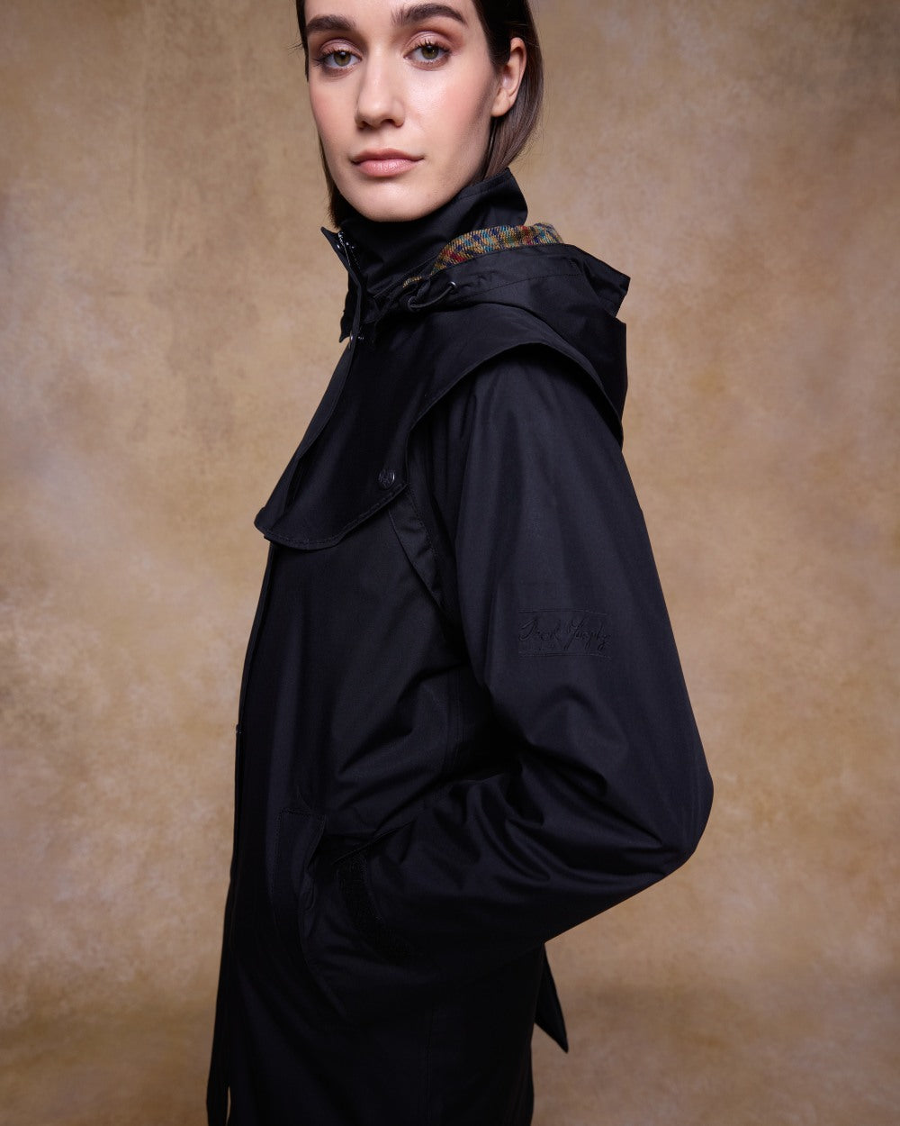 Black Coloured Jack Murphy Cotswold Ladies Waterproof 3/4 Coat on indoor background 