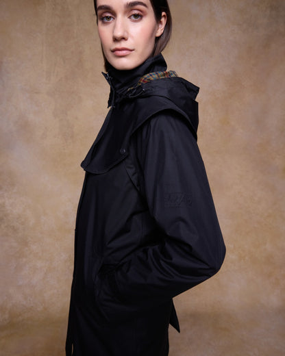 Black Coloured Jack Murphy Cotswold Ladies Waterproof 3/4 Coat on indoor background 