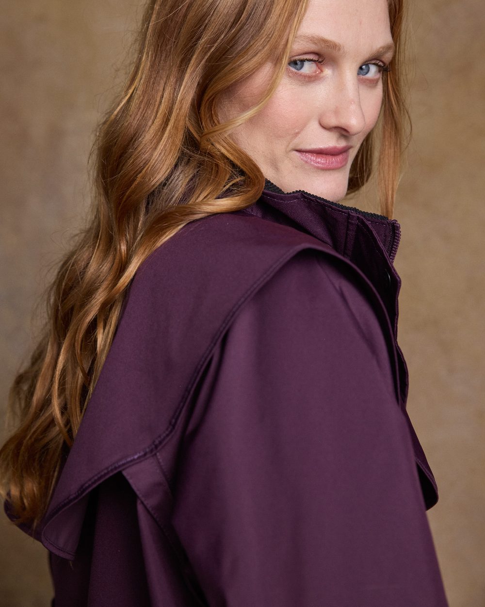 Blackberry Coloured Jack Murphy Cotswold Ladies Waterproof 3/4 Coat on indoor background 