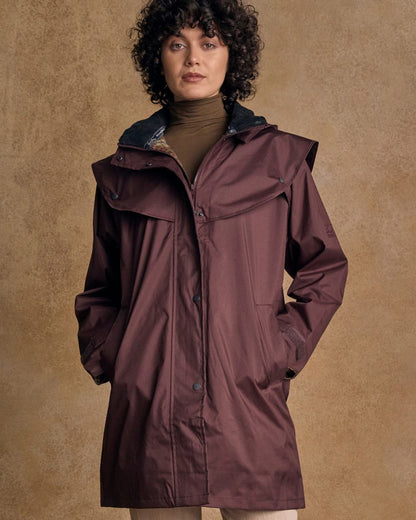 Deep Claret Coloured Jack Murphy Cotswold Ladies Waterproof 3/4 Coat on indoor background 