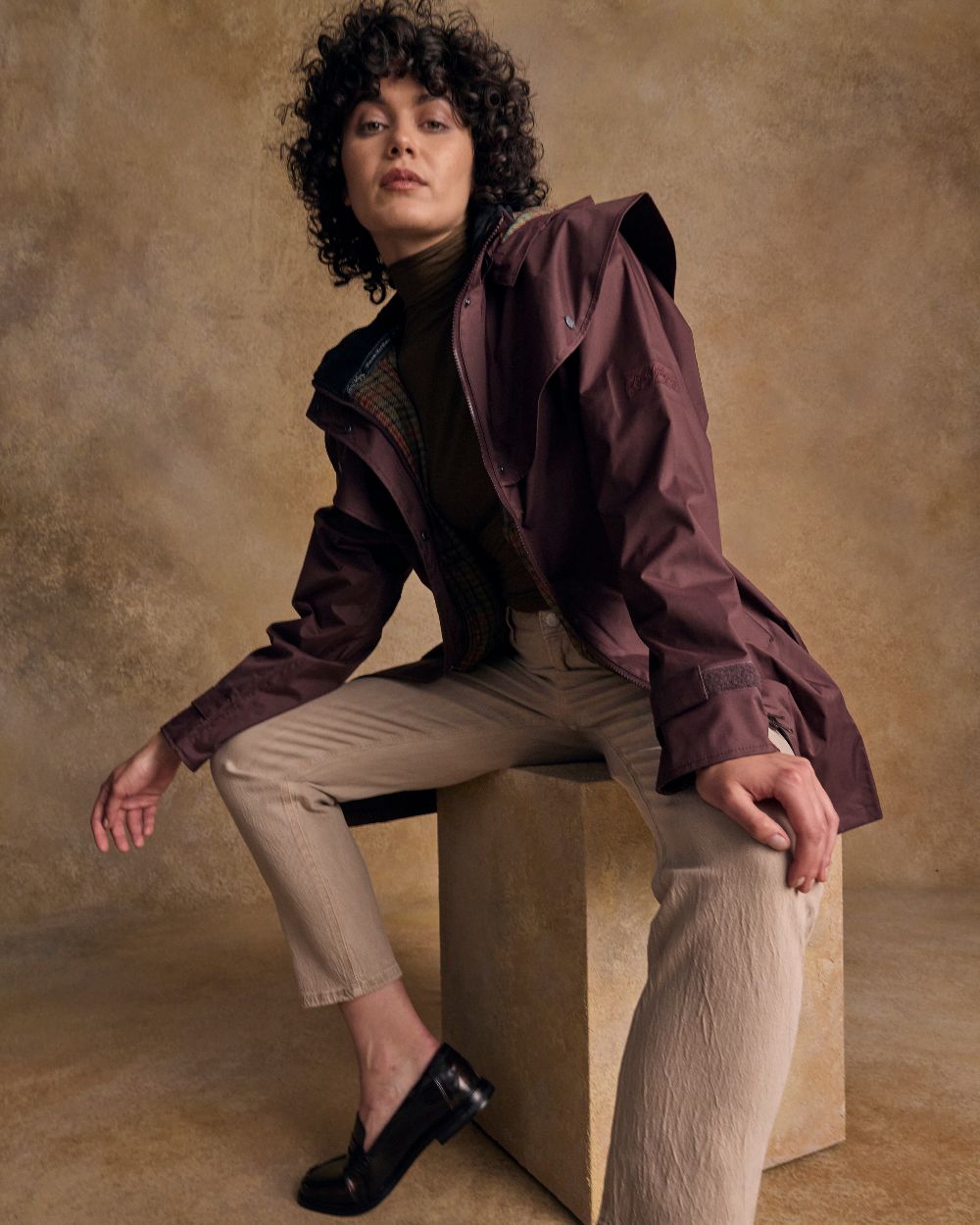 Deep Claret Coloured Jack Murphy Cotswold Ladies Waterproof 3/4 Coat on indoor background 
