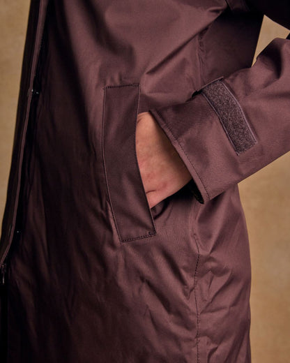 Deep Claret Coloured Jack Murphy Cotswold Ladies Waterproof 3/4 Coat on indoor background 