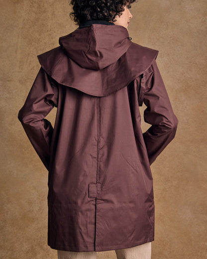 Deep Claret Coloured Jack Murphy Cotswold Ladies Waterproof 3/4 Coat on indoor background 