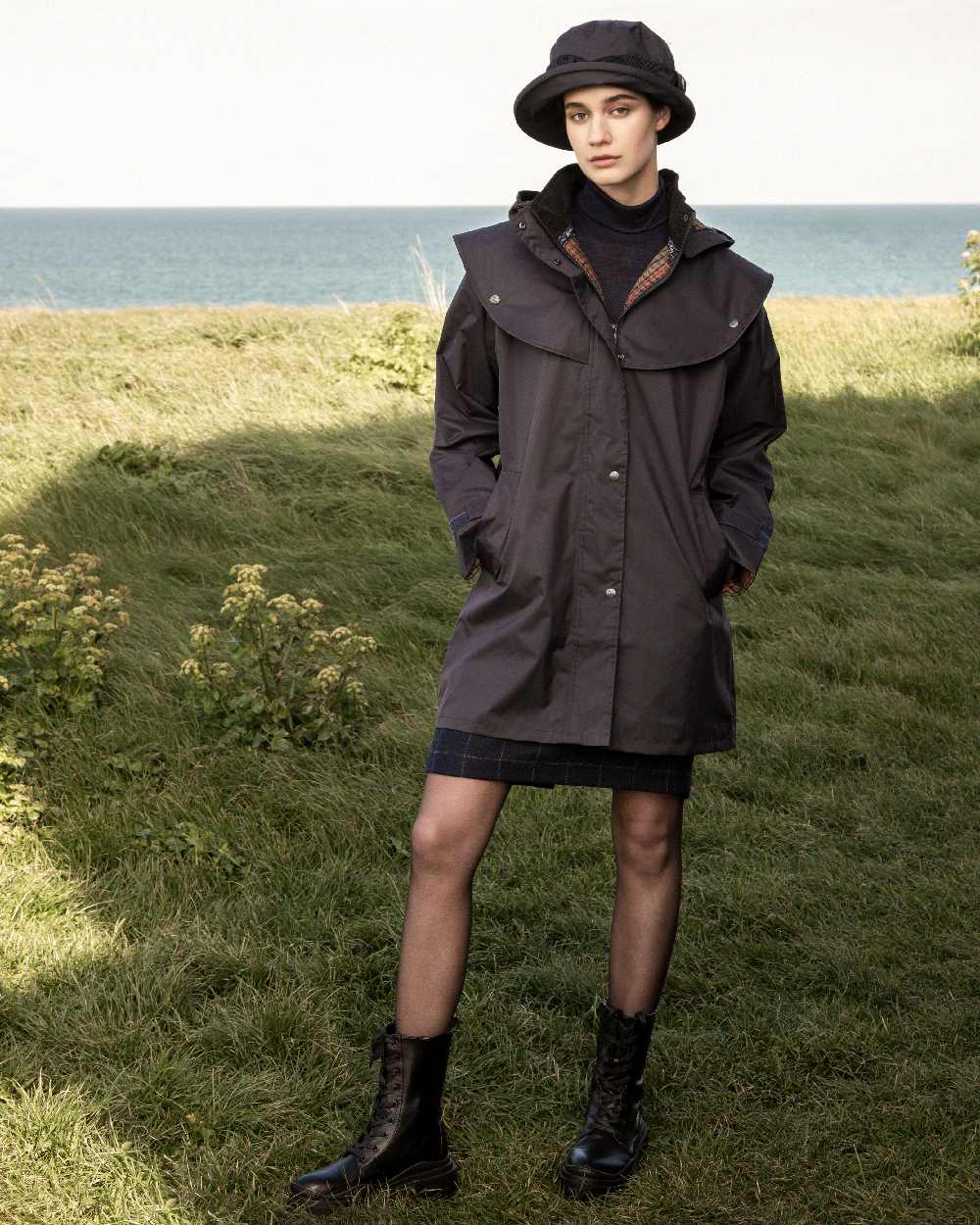 Olive Coloured Jack Murphy Cotswold Ladies Waterproof 3/4 Coat on outdoor background 