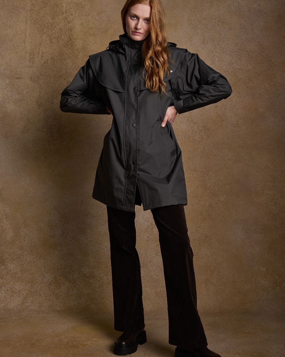Black Coloured Jack Murphy Cotswold Ladies Waterproof 3/4 Coat on indoor background 