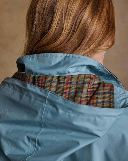 Smoke Blue Coloured Jack Murphy Cotswold Ladies Waterproof 3/4 Coat on indoor background 