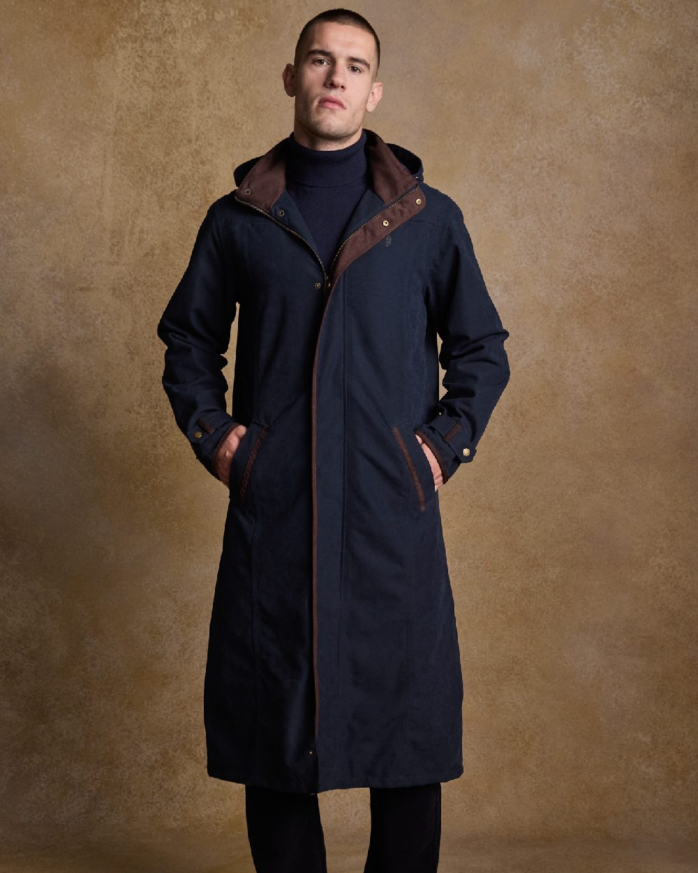 Navy Coloured Jack Murphy Emmet Waterproof Long Coat on indoor background 