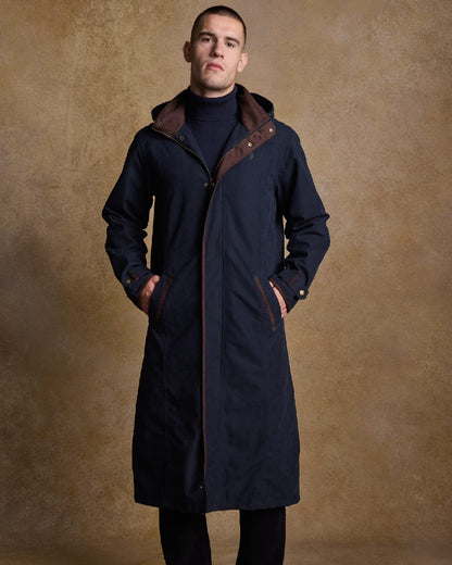 Navy Coloured Jack Murphy Emmet Waterproof Long Coat on indoor background 