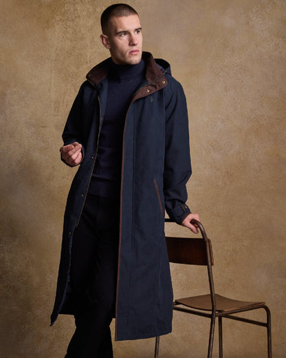 Navy Coloured Jack Murphy Emmet Waterproof Long Coat on indoor background 
