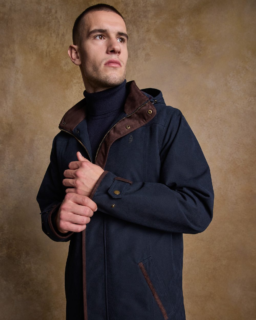 Navy Coloured Jack Murphy Emmet Waterproof Long Coat on indoor background 