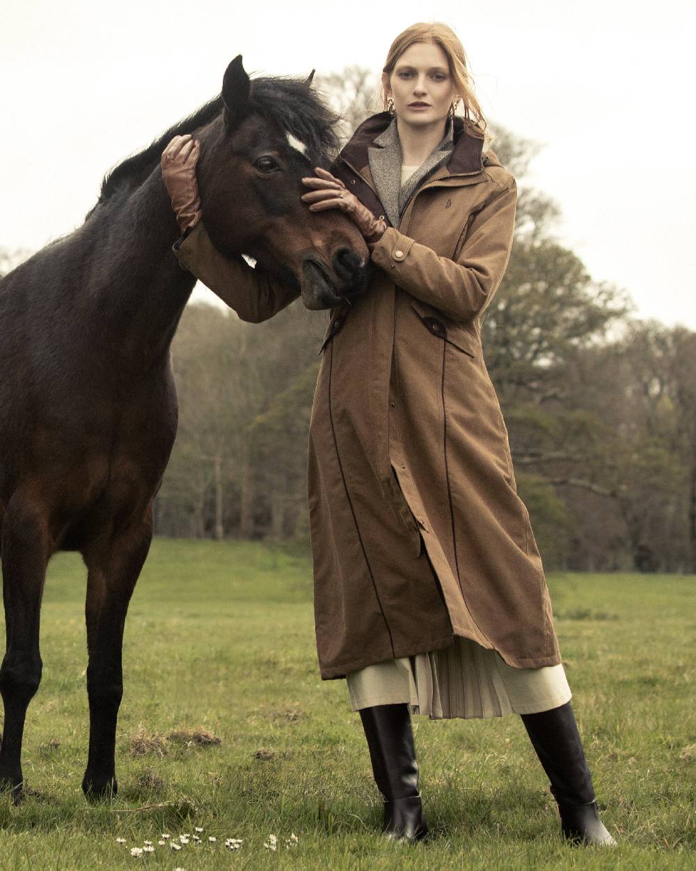 Camel Coloured Jack Murphy Erin Long Waterproof Coat on outdoor background 