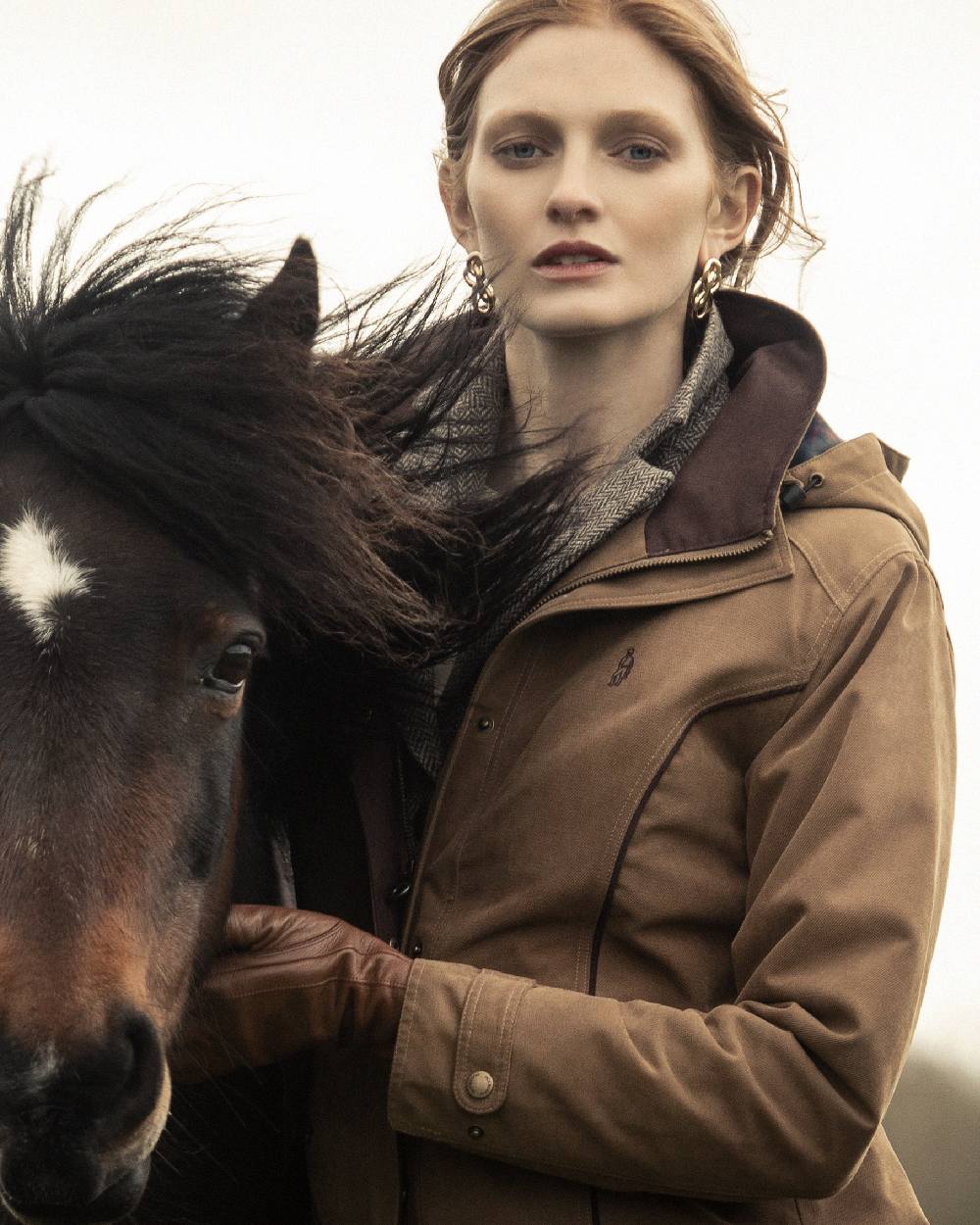 Camel Coloured Jack Murphy Erin Long Waterproof Coat on outdoor background 