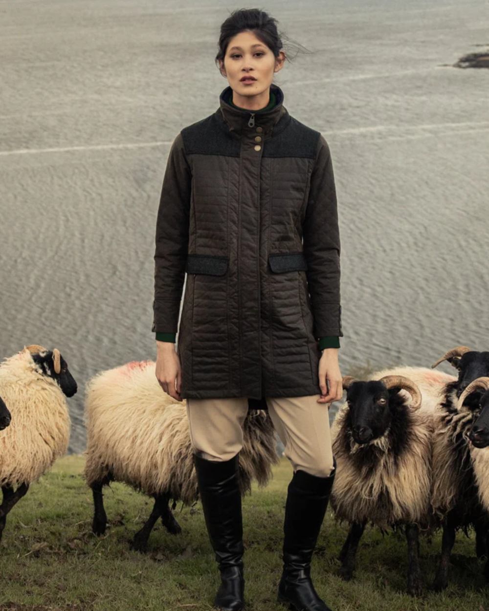 Olive Coloured Jack Murphy Jodie Wax Coat on sea background 