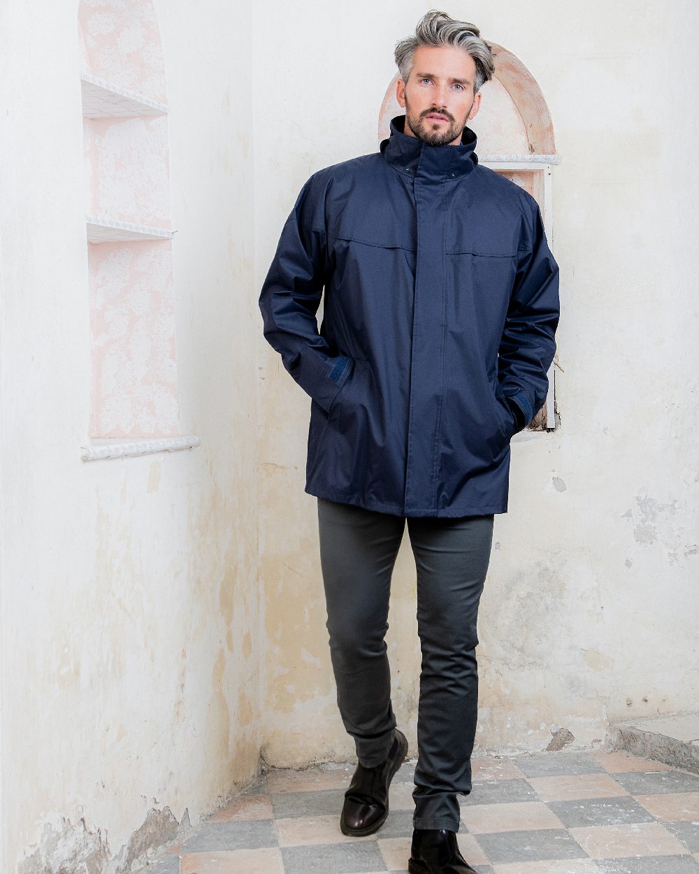 Navy Coloured Jack Murphy Kingston Waterproof Jacket on studio background 