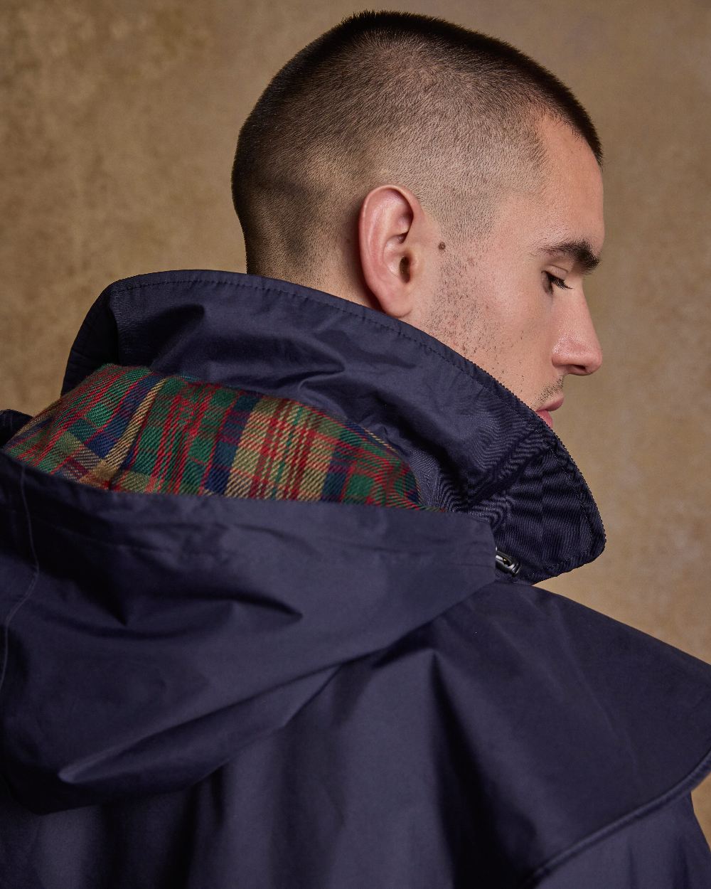 Navy Coloured Jack Murphy Lambourne Mens Long Bush Coat on indoor background 