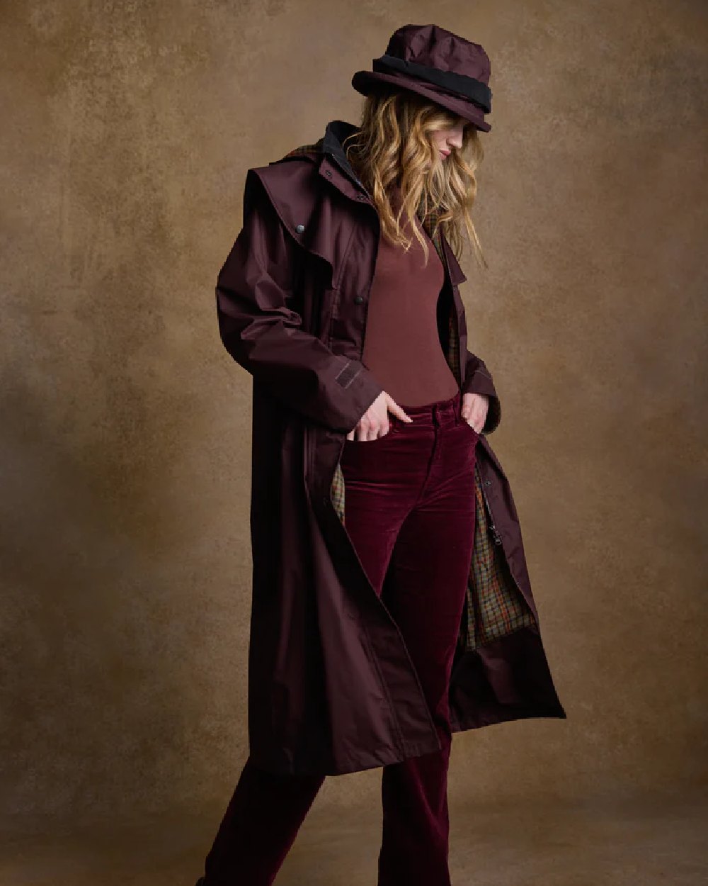 Deep Claret coloured Jack Murphy Malvern Heritage Rain Hat on wall background 