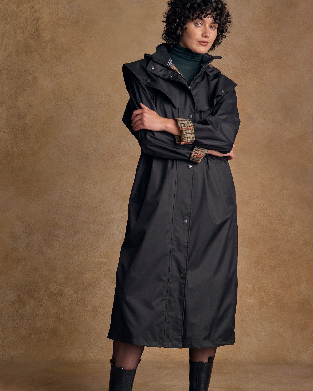 Black Coloured Jack Murphy Malvern Ladies Waterproof Bush Coat on indoor background 