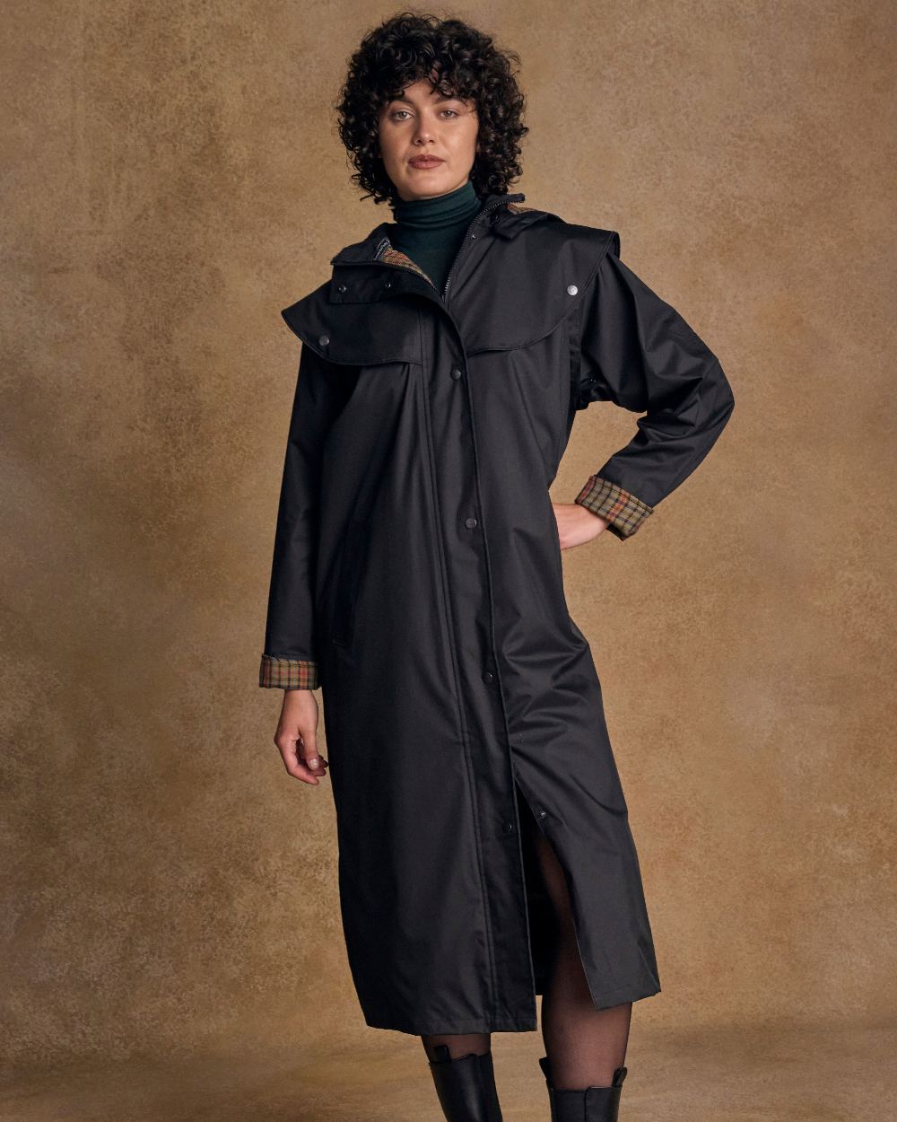 Black Coloured Jack Murphy Malvern Ladies Waterproof Bush Coat on indoor background 