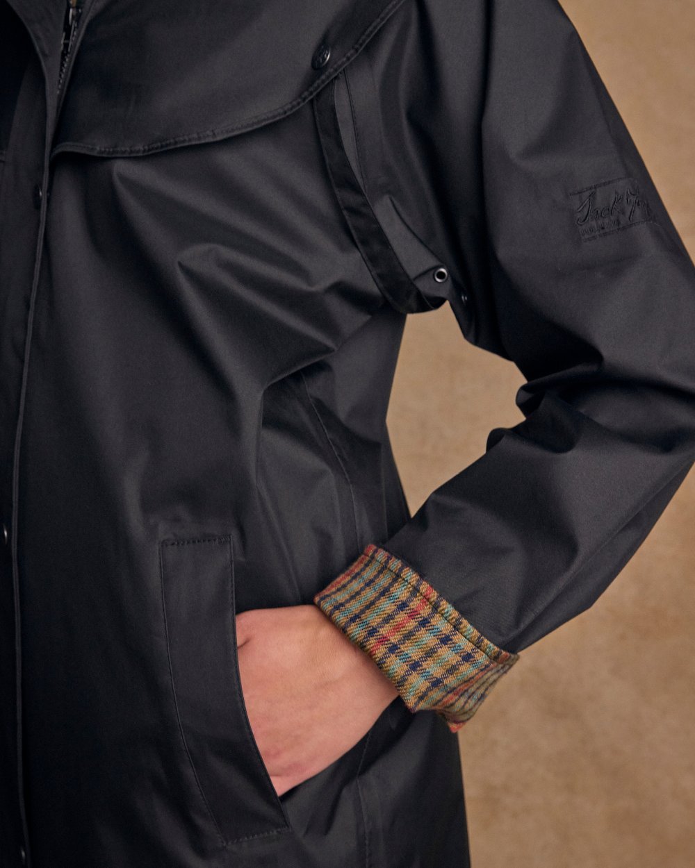 Black Coloured Jack Murphy Malvern Ladies Waterproof Bush Coat on indoor background 