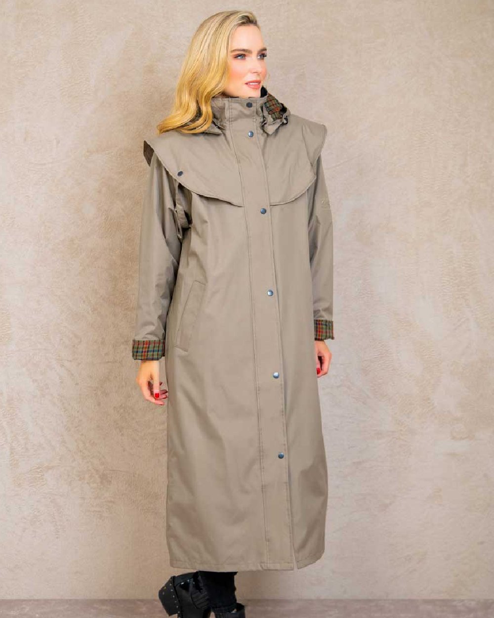 Chinchilla coloured Jack Murphy Malvern Ladies Waterproof Bush Coat on wall background 