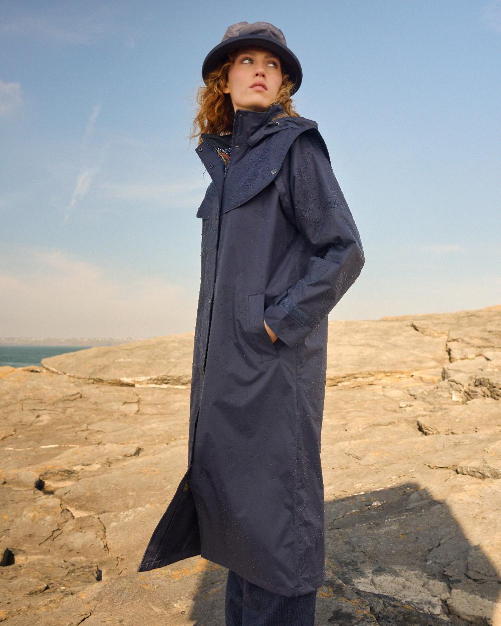 Heritage Navy Coloured Jack Murphy Malvern Ladies Waterproof Bush Coat on outdoor background 