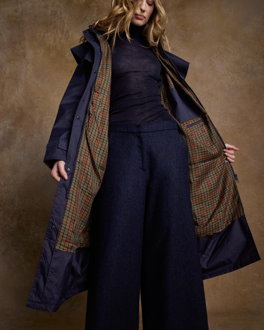 Heritage Navy Coloured Jack Murphy Malvern Ladies Waterproof Bush Coat on indoor background 