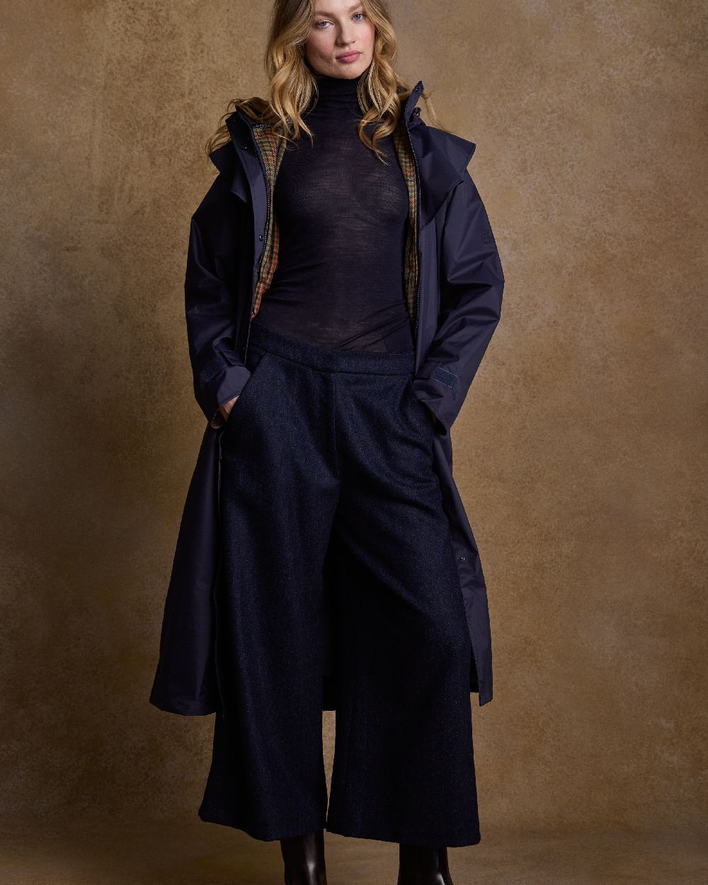 Heritage Navy Coloured Jack Murphy Malvern Ladies Waterproof Bush Coat on indoor background 