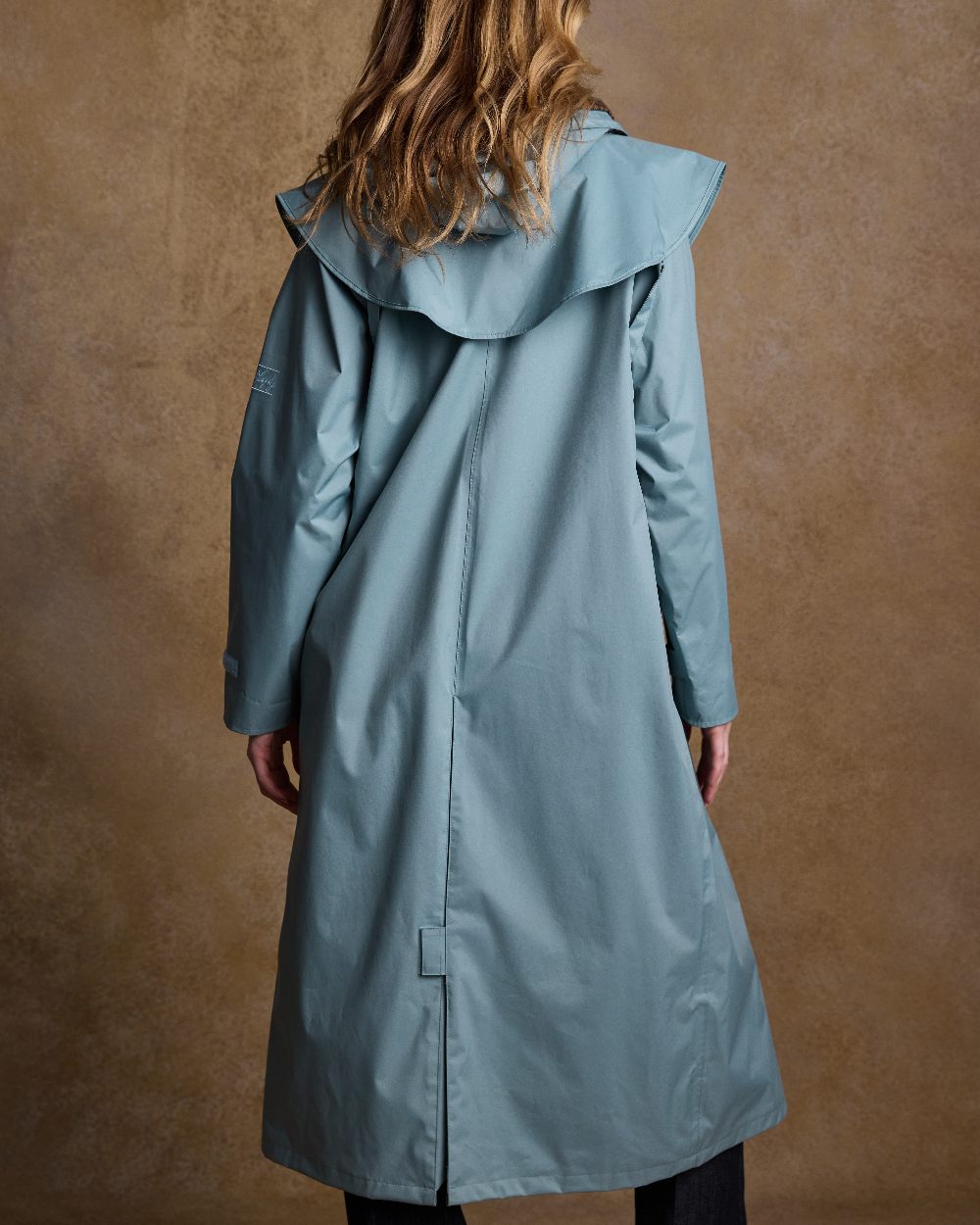 Smokey Blue Coloured Jack Murphy Malvern Ladies Waterproof Bush Coat on indoor background 