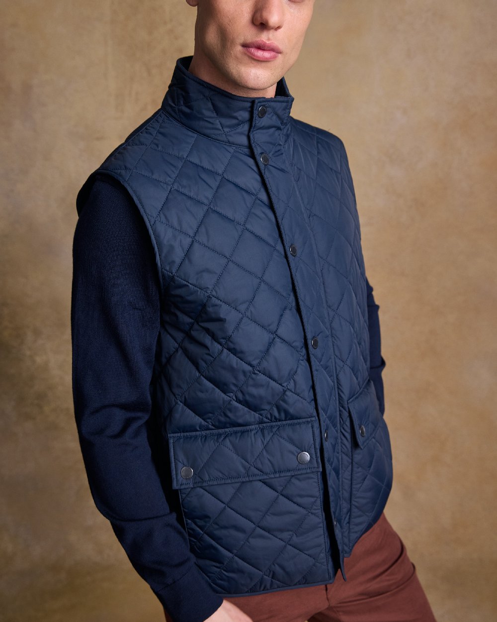 Navy Coloured Jack Murphy Mens Conor Quilted Gilet on indoor background 
