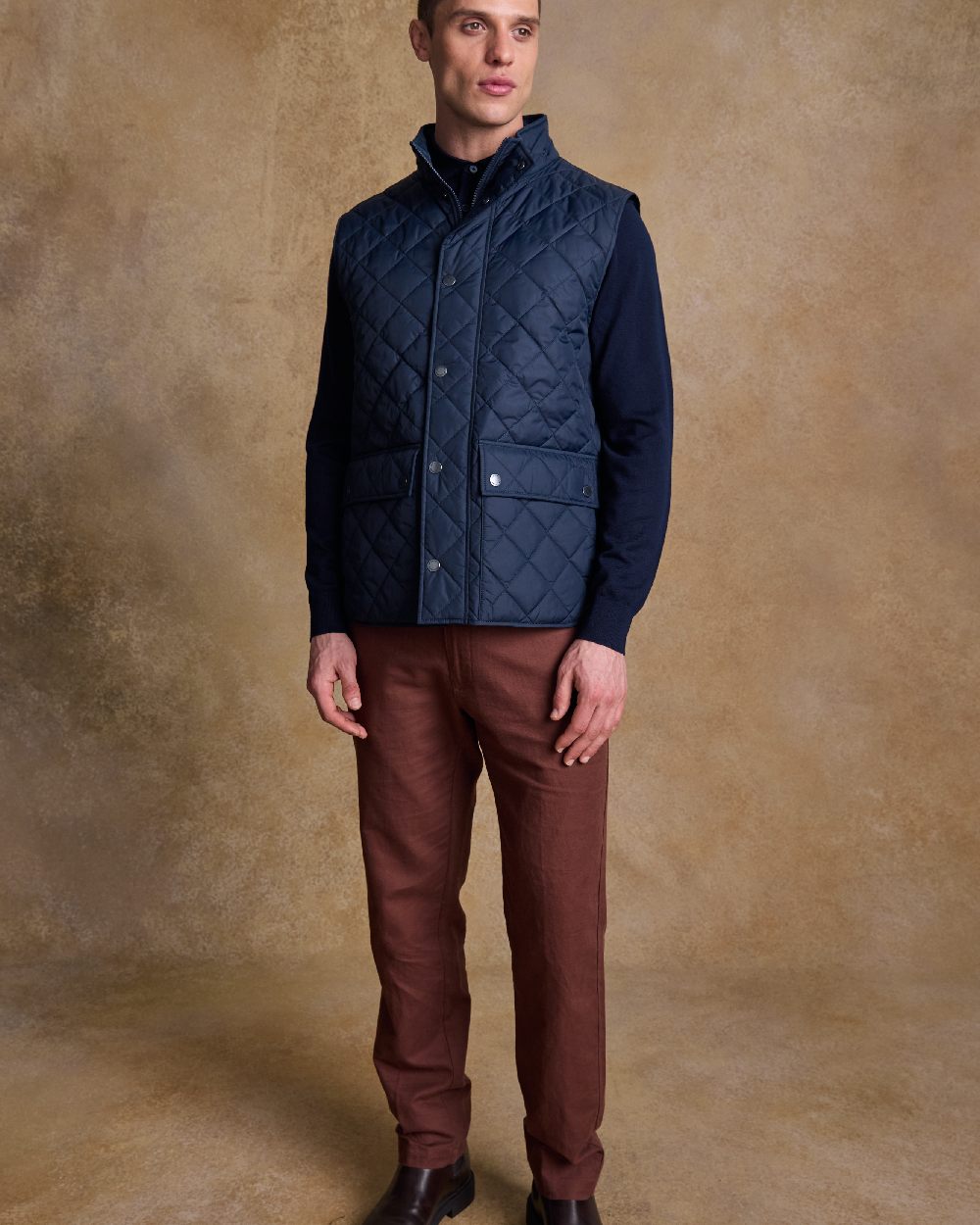 Navy Coloured Jack Murphy Mens Conor Quilted Gilet on indoor background 