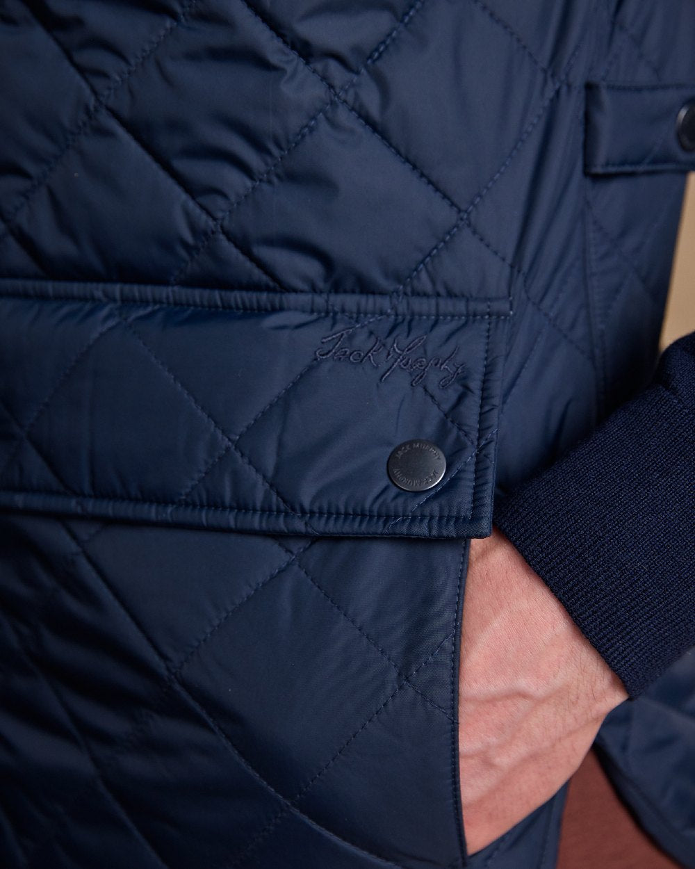 Navy Coloured Jack Murphy Mens Conor Quilted Gilet on indoor background 