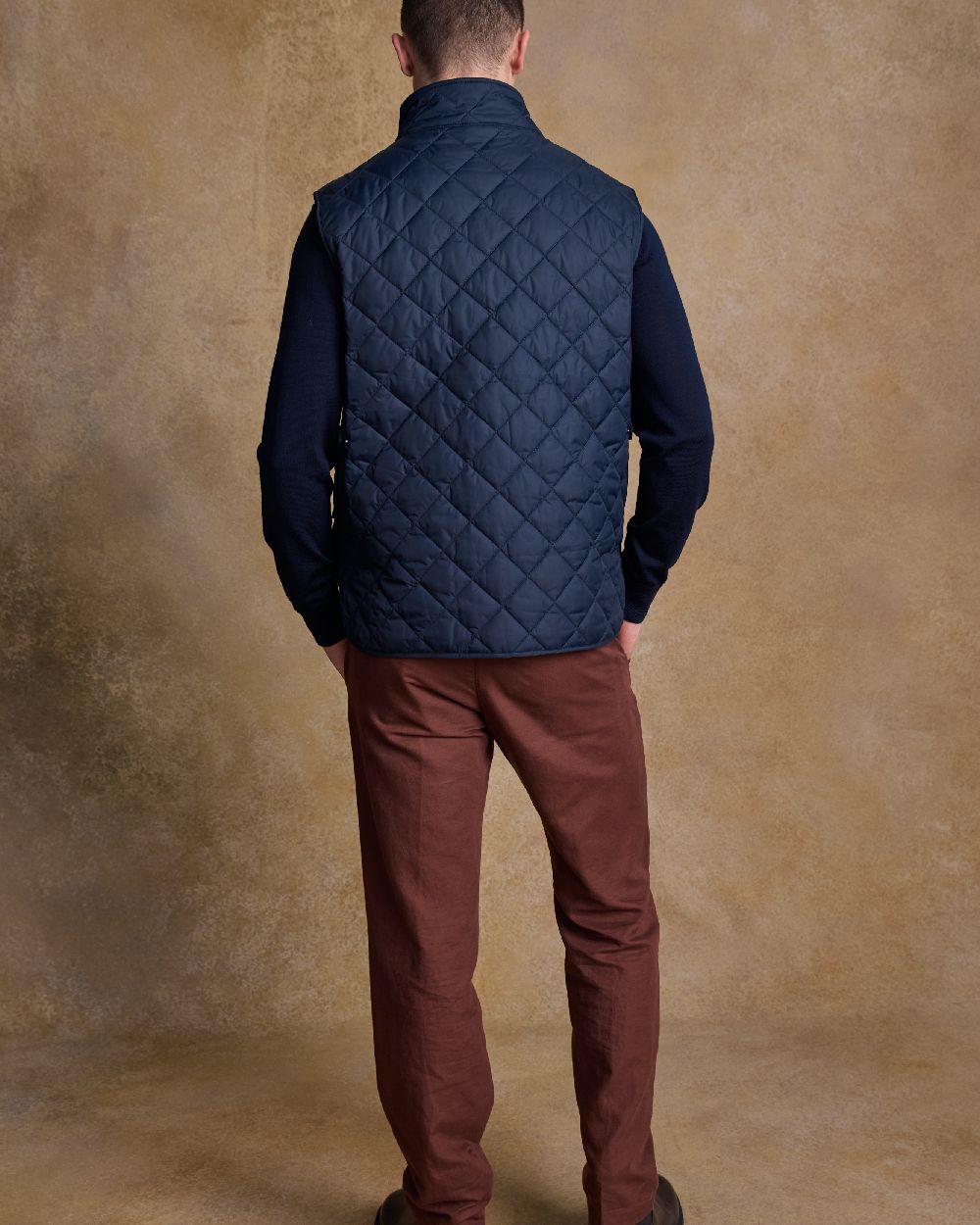 Navy Coloured Jack Murphy Mens Conor Quilted Gilet on indoor background 