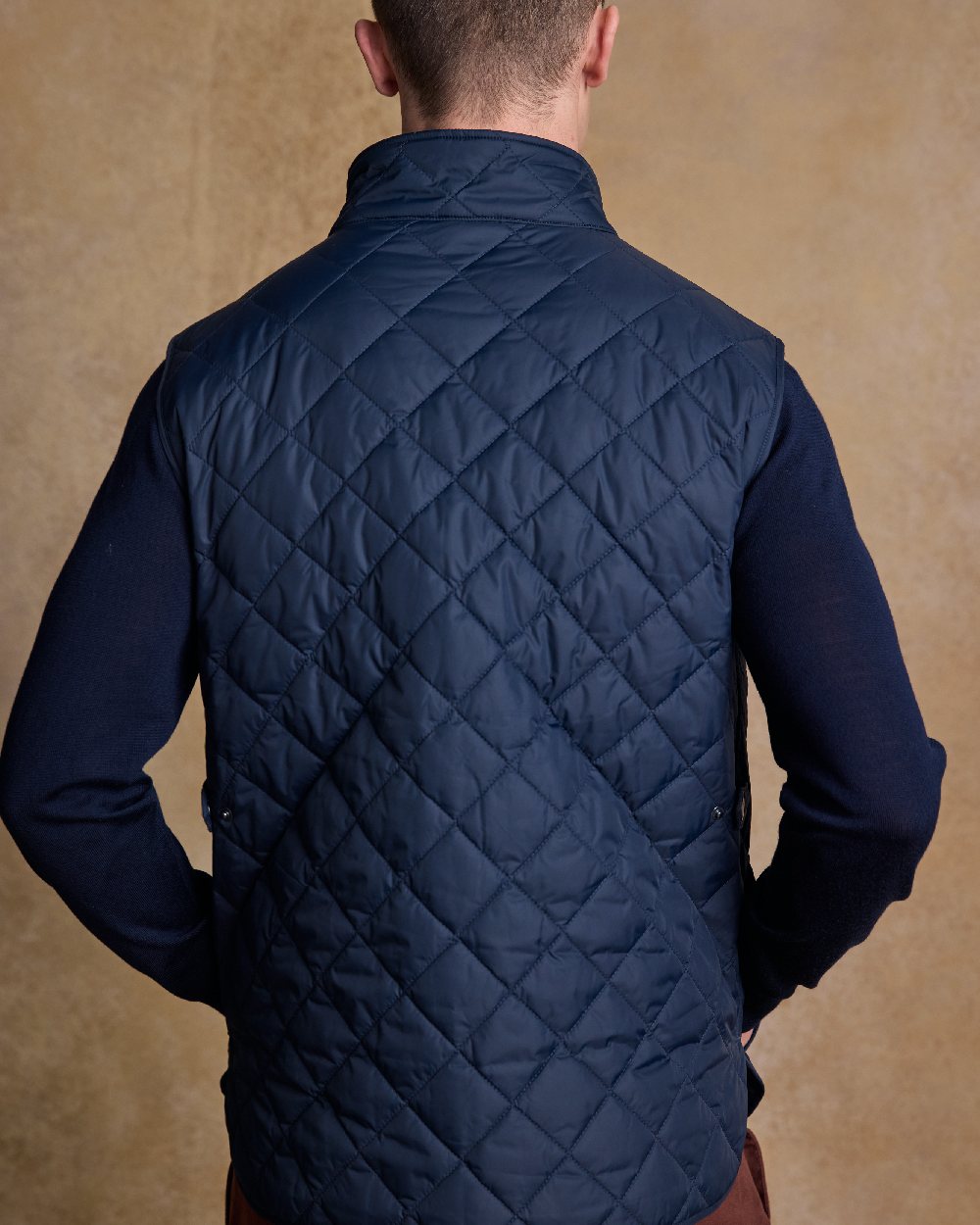 Navy Coloured Jack Murphy Mens Conor Quilted Gilet on indoor background 