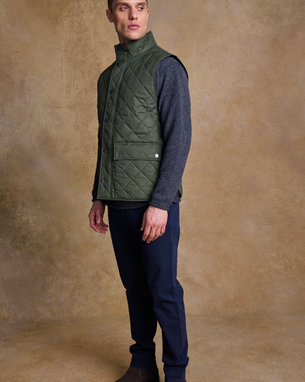 Olive Coloured Jack Murphy Mens Conor Quilted Gilet on indoor background 