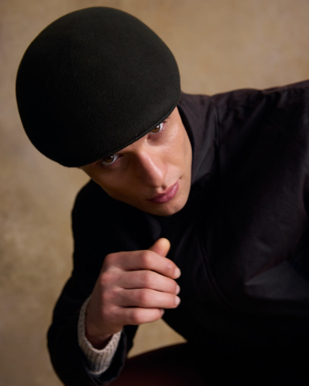 Olive Coloured Jack Murphy Mens Galway Felt Flat Cap on indoor background 