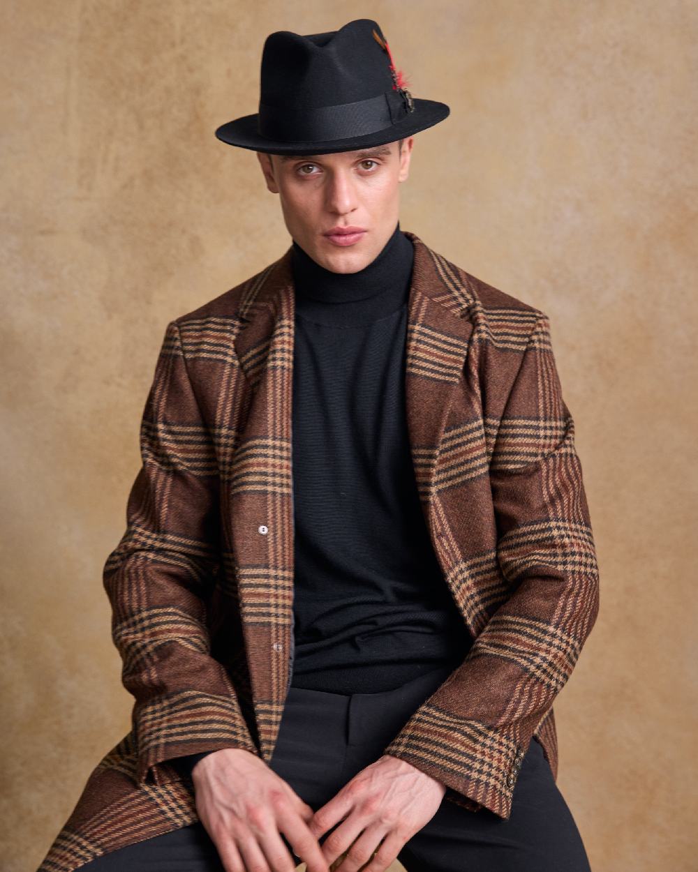 Black Coloured Jack Murphy Mens Kildare Trilby Felt Hat on indoor background 