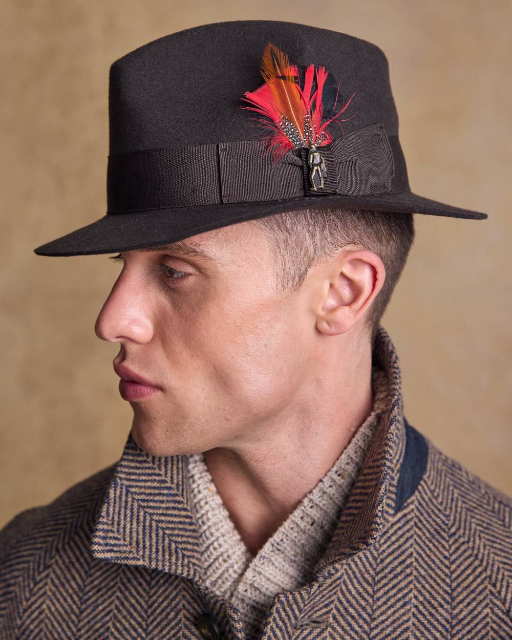 Brown Coloured Jack Murphy Mens Kildare Trilby Felt Hat on indoor background 