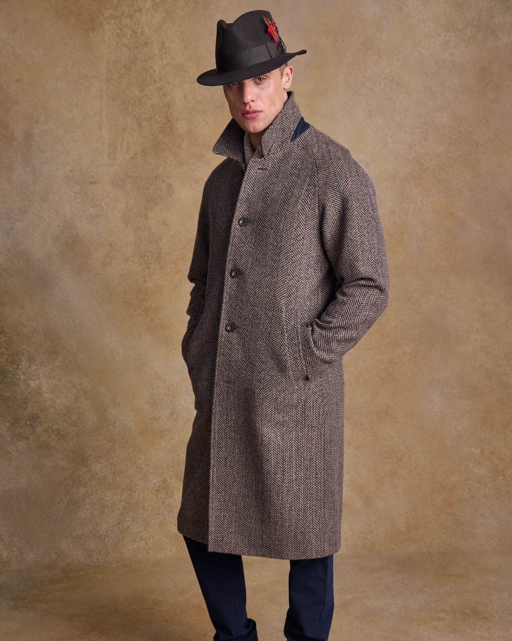 Brown Coloured Jack Murphy Mens Kildare Trilby Felt Hat on indoor background 