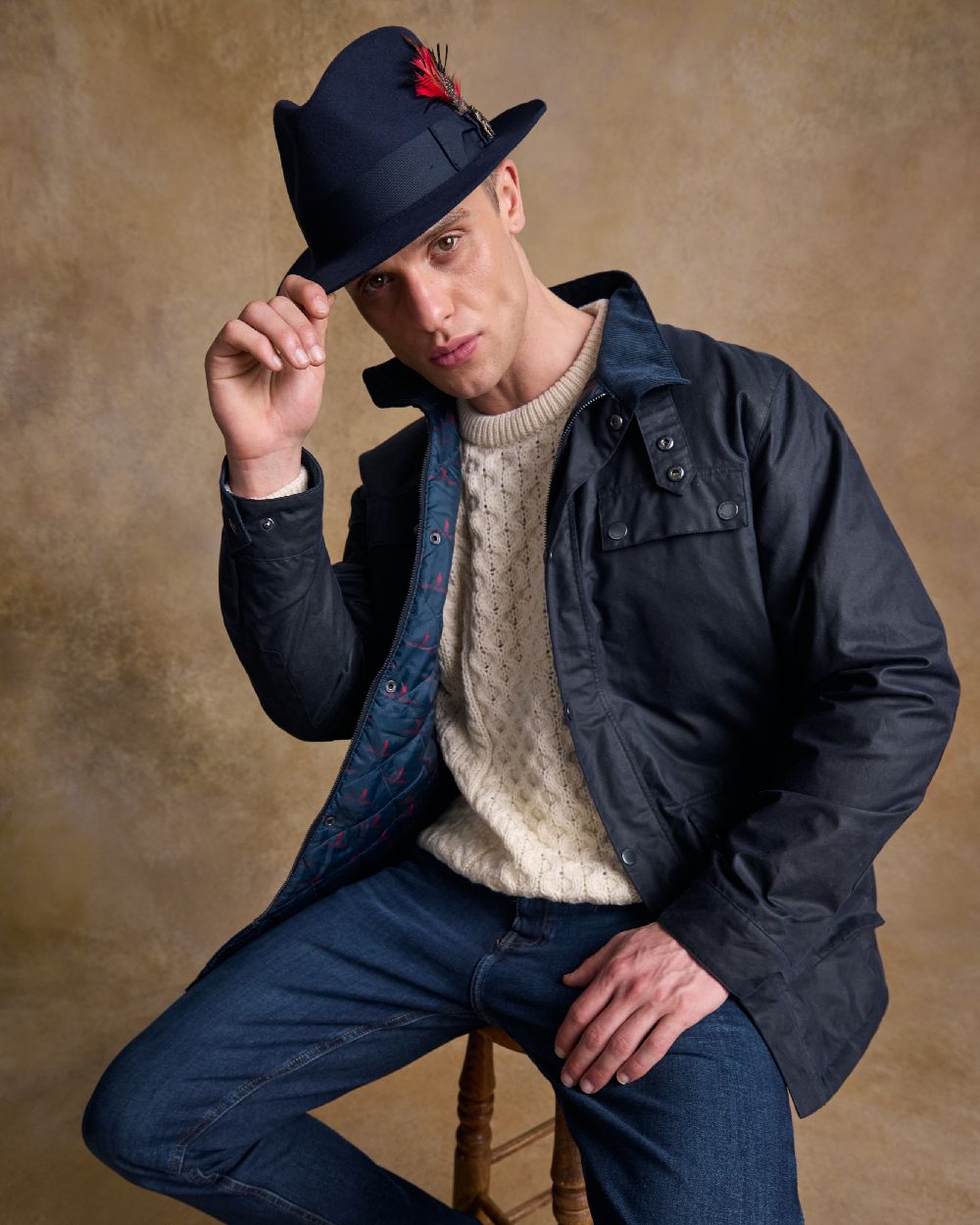 Navy Coloured Jack Murphy Mens Kildare Trilby Felt Hat on indoor background 