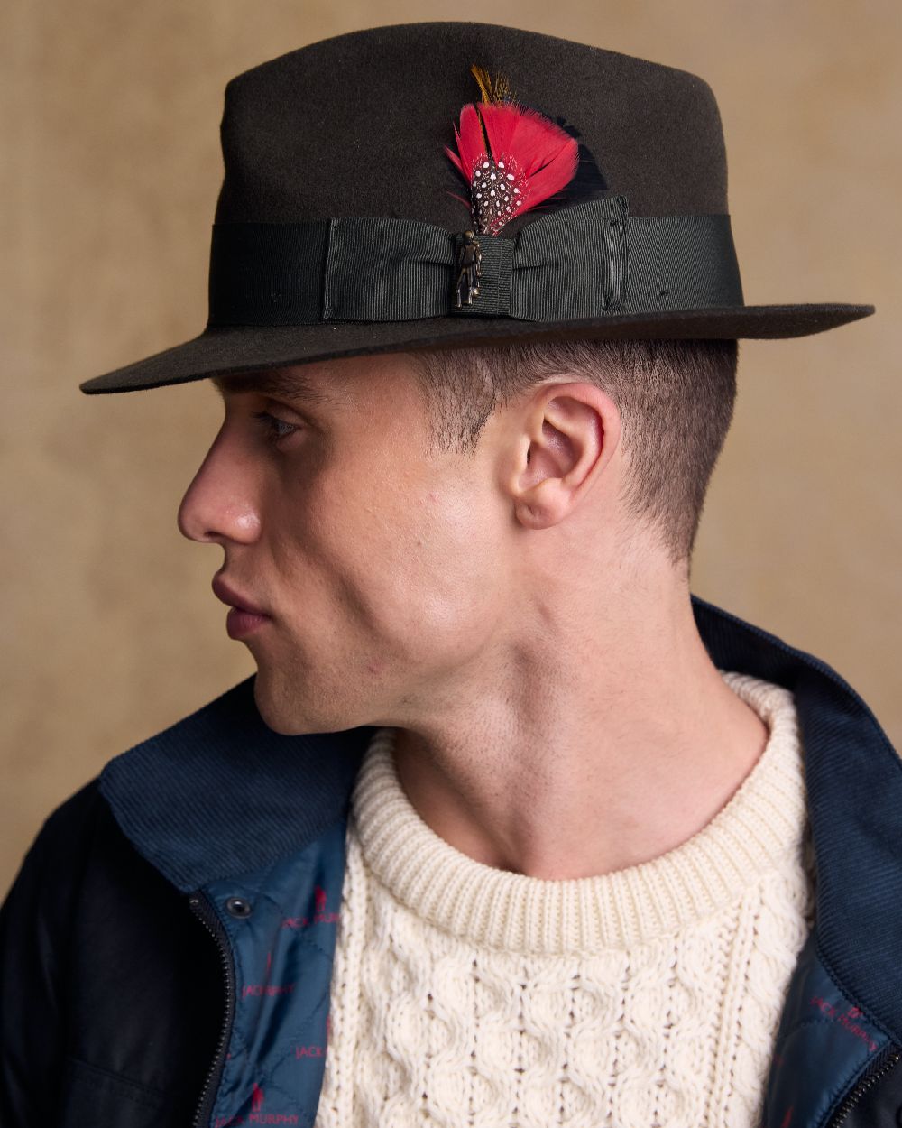 Olive Coloured Jack Murphy Mens Kildare Trilby Felt Hat on indoor background 