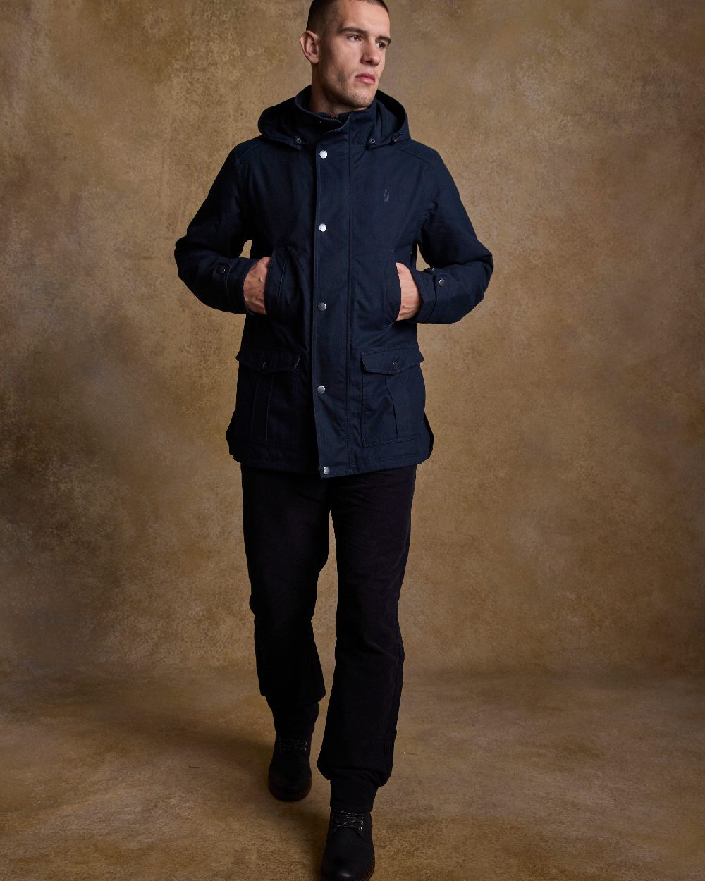 Navy Coloured Jack Murphy Mens Michael Waterproof Jacket on indoor background 