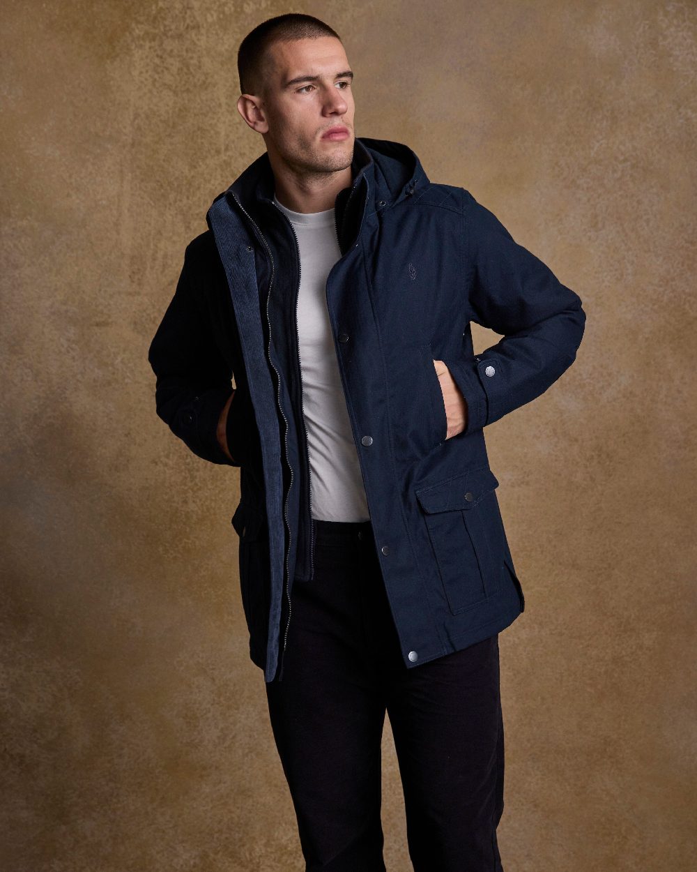 Navy Coloured Jack Murphy Mens Michael Waterproof Jacket on indoor background 