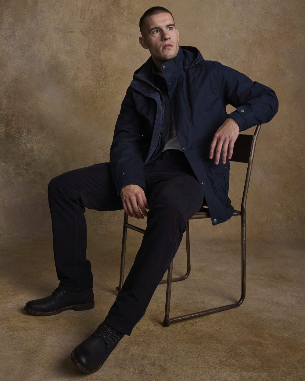 Navy Coloured Jack Murphy Mens Michael Waterproof Jacket on indoor background 